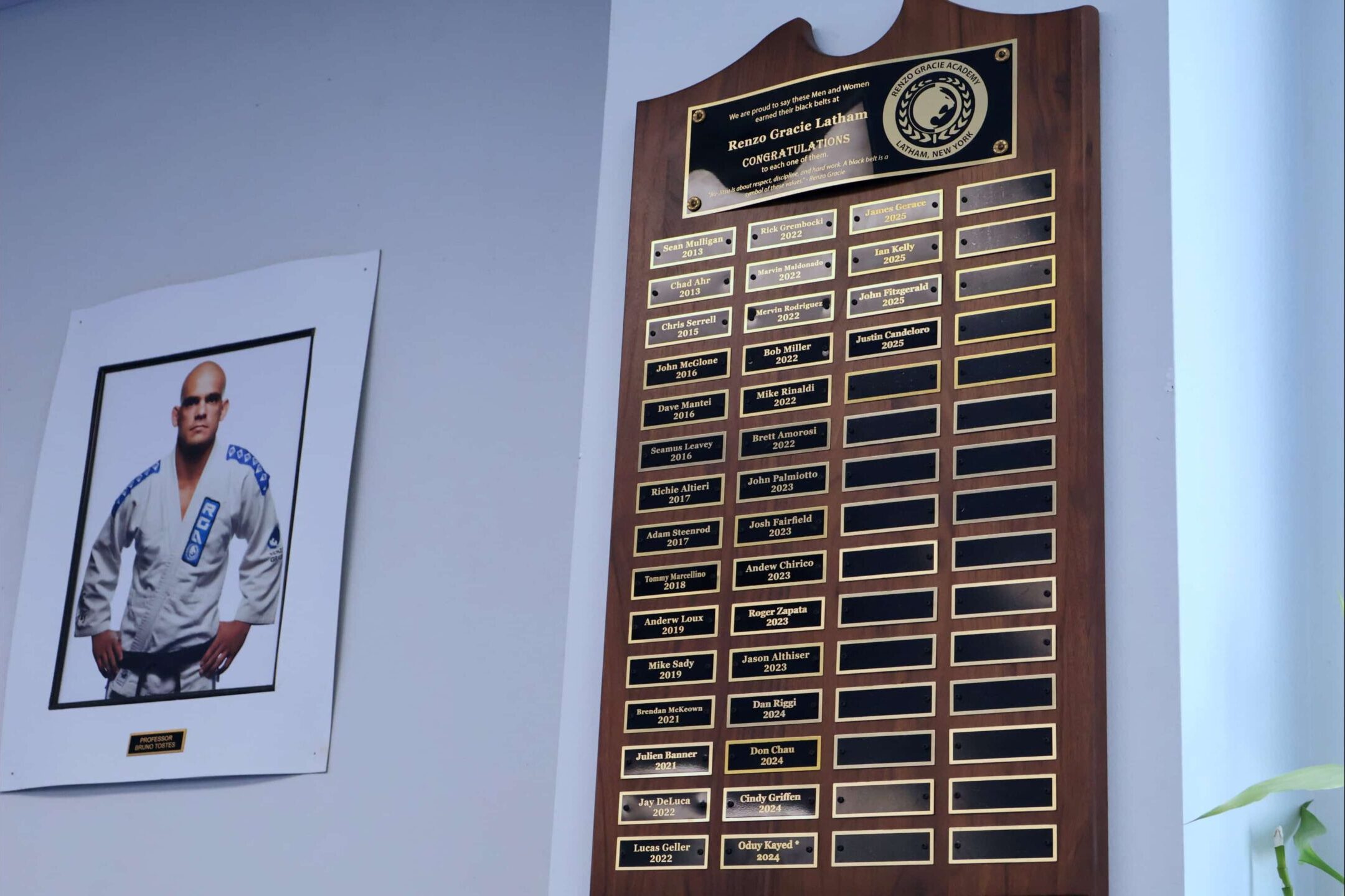A Board with the names of all the Black Belts Under Professor Bruno Tostes of Renzo Gracie Latham
